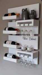 Interior Designs. Stunning Bar Shelves For Small Corners, small corner bar shelves, corner bar shelf ideas, compact home bar shelves, modern bar shelves, stylish bar shelving, space-saving bar shelves, wall-mounted bar shelves, floating bar shelves, corner liquor shelves, home bar storage ideas, small home bar design, modern home bar ideas, luxury bar shelves, custom bar shelves, bespoke bar shelving, wooden bar shelves, glass bar shelves, contemporary bar storage, minimalist bar shelves, apartment bar shelves, dining room bar shelves, living room bar shelves, kitchen bar shelves, corner storage solutions, small space interior design, functional home bar ideas, custom interior furniture, modern interior design Kenya, home bar design Kenya, bar shelves Kenya, custom bar shelves Kenya, bar shelf installation Kenya, interior designers Kenya, bar shelves Nairobi, corner bar shelves Nairobi, small home bar Nairobi, custom bar shelves Nairobi, modern bar shelves Nairobi, home bar design Nairobi, bar shelf installation Nairobi, Westlands bar shelves, Kilimani bar shelves, Karen bar shelves, Runda bar shelves, Lavington bar shelves, Kileleshwa bar shelves, Muthaiga bar shelves, Parklands bar shelves, Kasarani bar shelves, Roysambu bar shelves, Kiambu bar shelves, Thika bar shelves, Mombasa bar shelves, Kenya bar shelves, Kenya home bar design, Mercie Interiors, Mercie Interiors Nairobi, Mercie Interiors Kenya.
