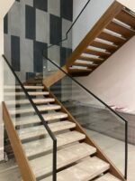 Interior Designs. Contemporary L-Shaped Staircase For Homes, modern L-shaped staircase, contemporary staircase design, L-shaped staircase design, modern staircase for homes, residential staircase design, luxury staircase design, custom L-shaped staircase, bespoke staircase for home, stylish staircase ideas, space-saving staircase, modern indoor staircase, elegant home staircase, staircase installation services, custom staircase installation, modern staircase railing, wooden L-shaped staircase, glass staircase design, metal staircase design, floating staircase design, staircase renovation, home interior staircase, luxury home interiors, modern house staircase, staircase contractors Kenya, staircase installation Kenya, staircase design Kenya, interior designers Kenya, Nairobi staircase design, Nairobi staircase installation, L-shaped staircase Nairobi, modern staircase Nairobi, custom staircase Nairobi, home interior design Nairobi, luxury interior design Nairobi, staircase contractors Nairobi, Westlands staircase design, Kilimani staircase design, Karen staircase design, Runda staircase design, Lavington staircase design, Kileleshwa staircase design, Muthaiga staircase design, Parklands staircase design, Kasarani staircase design, Roysambu staircase design, Kiambu staircase design, Thika staircase design, Machakos staircase design, Mombasa staircase design, Kenya staircase design, Kenya interior design, residential staircase Kenya, modern home interiors Kenya, bespoke staircase Kenya, custom interior solutions Kenya, Mercie Interiors Nairobi, Mercie Interiors Kenya.