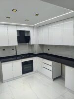 Interior Designers. Modern built-in kitchen cabinets, custom kitchen cabinets Kenya, built-in kitchen cabinet installation Nairobi, modern kitchen cabinetry designs, fitted kitchen cabinets Kenya, bespoke kitchen cabinets Nairobi, luxury kitchen cabinet designs, contemporary kitchen storage cabinets, custom-made kitchen cupboards, floor-to-ceiling kitchen cabinets, modular kitchen cabinets Kenya, modern fitted kitchens Nairobi, minimalist kitchen cabinet designs, L-shaped kitchen cabinets, U-shaped kitchen cabinets, galley kitchen cabinet designs, small kitchen storage cabinets, space-saving kitchen cabinetry, kitchen cabinets with drawers, kitchen cabinets with shelves, kitchen cabinets with pull-out baskets, soft-close kitchen cabinet doors, handleless kitchen cabinets, kitchen cabinets with LED lighting, built-in pantry cabinets, custom kitchen island cabinets, kitchen base cabinets Kenya, overhead kitchen cabinets, wall-mounted kitchen cabinets, tall kitchen storage cabinets, corner kitchen cabinets, built-in appliance cabinets, kitchen cabinets for fitted ovens, integrated refrigerator cabinets, built-in microwave cabinets, modern kitchen cabinet finishes, high-gloss kitchen cabinets, matte-finish kitchen cabinets, wooden kitchen cabinets Kenya, mahogany kitchen cabinets, MDF kitchen cabinets, plywood kitchen cabinets, melamine kitchen cabinets, laminate kitchen cabinets, oak-finish kitchen cabinets, walnut kitchen cabinet designs, white kitchen cabinets, black kitchen cabinets, grey kitchen cabinets, cream kitchen cabinets, two-tone kitchen cabinet designs, natural wood kitchen cabinetry, modern kitchen cabinet colours, luxury kitchen cabinetry materials, custom kitchen cabinet makers Nairobi, kitchen carpentry services Kenya, kitchen cabinet fabrication Nairobi, fitted kitchen installation Kenya, kitchen renovation services Nairobi, kitchen remodeling Kenya, kitchen interior design Nairobi, modern kitchen design services Kenya, kitchen cabinet suppliers Nairobi, kitchen furniture manufacturers Kenya, bespoke cabinetry installation, kitchen countertop and cabinet installation, quartz countertop kitchen cabinets, granite countertop kitchen designs, marble-look kitchen cabinets, kitchen backsplash and cabinet design, kitchen sink cabinet installation, kitchen storage optimization, organized kitchen cabinet solutions, pantry organization cabinets, custom kitchen drawer organizers, kitchen cabinet hardware Kenya, kitchen hinges and drawer runners, soft-close drawer installation, kitchen cabinet door replacement, kitchen cabinet repair Nairobi, kitchen cabinet refurbishment Kenya, affordable kitchen cabinets Nairobi, luxury fitted kitchen installation, custom kitchen measurements and planning, modern home kitchen upgrades, residential kitchen interior design, apartment kitchen cabinet designs, maisonette kitchen cabinetry, villa kitchen cabinet designs, compact kitchen cabinets for bedsitters, open-plan kitchen cabinetry, contemporary kitchen finishing Kenya, kitchen cabinet installation cost Kenya, kitchen cabinet prices Nairobi, affordable fitted kitchens Kenya, premium kitchen furniture Nairobi, kitchen renovation contractors Kenya, kitchen design consultation Nairobi, kitchen construction and finishing services, modern kitchen cabinet ideas Kenya, built-in kitchen storage solutions, durable kitchen cabinets for homes, moisture-resistant kitchen cabinetry, custom kitchen cabinet installation Westlands, fitted kitchen cabinets Kilimani, kitchen renovation Lavington, luxury kitchen cabinets Karen, bespoke kitchen cabinetry Runda, kitchen cabinet makers Kileleshwa, fitted kitchen installation Parklands, kitchen cabinets Kiambu, kitchen cabinet installation Thika, modern kitchen cabinets Mombasa, fitted kitchen designs Kisumu, kitchen cabinet makers Nakuru, kitchen renovation Eldoret, built-in kitchen cabinets across Kenya, Kenya-wide kitchen interior design services, custom kitchen furniture solutions, modern fitted kitchen specialists Kenya, professional kitchen cabinet installation, contemporary kitchen cabinetry Nairobi